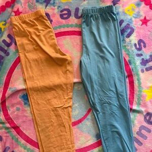 Girls 2 Pair of leggings size 14/16